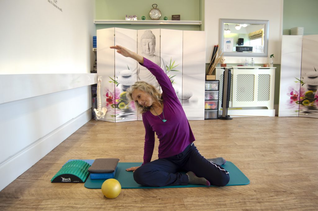 Tracey Job, Pilates Instructor, demonstrating a Pilates position